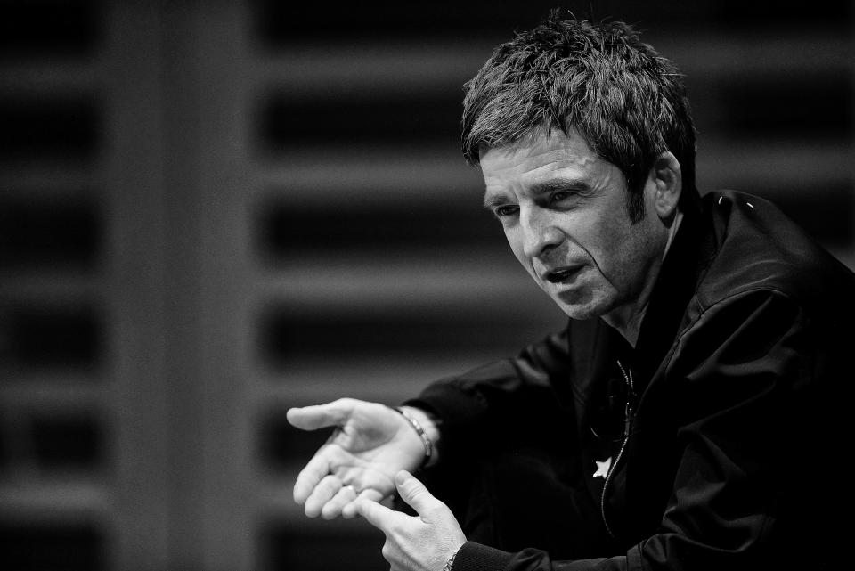 LONDON, ENGLAND - OCTOBER 23:  (EDITORS NOTE: Image has been converted to black and white.)  Noel Gallagher on stage during the launch of his new book "Any Road Will Get Us There (If We Don't Know Where We're Going)" at Kings Place on October 23, 2018 in London, England.  (Photo by Dave J Hogan/Dave J Hogan/Getty Images)