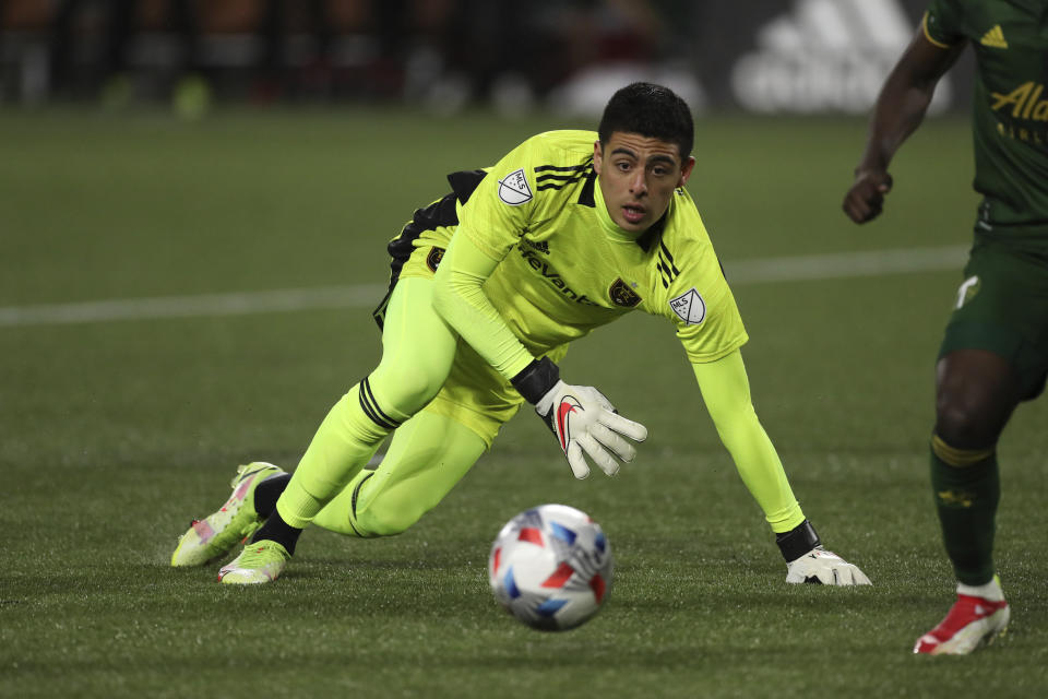 Real Salt Lake goalkeeper David Ochoa chases the ball during the first half of the team's MLS soccer Western Conference final against the Portland Timbers on Saturday, Dec. 4, 2021, in Portland, Ore. (AP Photo/Amanda Loman)