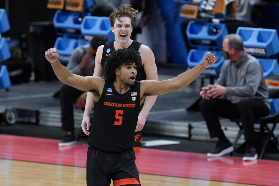 Oregon State guard Ethan Thompson (5) reacts to a basket against Tennessee during the second half of a men's college basketball game in the first round of the NCAA tournament at Bankers Life Fieldhouse in Indianapolis, Friday, March 19, 2021. (AP Photo/Paul Sancya)