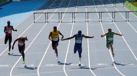 2016 Rio Olympics - Athletics - Final - Men's 400m Hurdles Final - Olympic Stadium - Rio de Janeiro, Brazil - 18/08/2016. Kerron Clement (USA) of USA wins the race REUTERS/David Gray