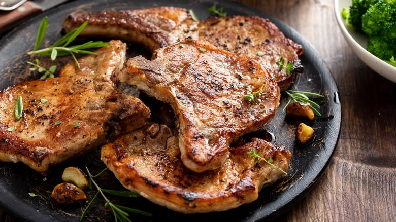 Cooked pork chops on plate