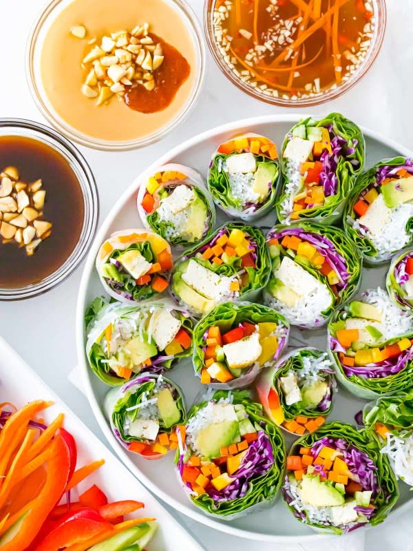 <p>Drive Me Hungry</p><p>These vegetarian summer rolls are filled with an assortment of rainbow colored vegetables, creamy avocado, and protein rich tofu! It’s the perfect meal for spring that’s light and refreshing!</p><p><strong>Get the recipe: <a href="https://drivemehungry.com/vegetarian-summer-rolls/" rel="nofollow noopener" target="_blank" data-ylk="slk:Vegetarian Summer Rolls;elm:context_link;itc:0;sec:content-canvas" class="link rapid-noclick-resp">Vegetarian Summer Rolls</a></strong></p>