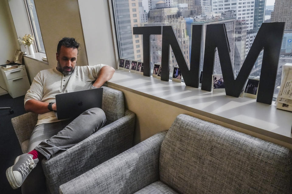 Ramin Beheshti, president and co-founder of The News Movement (TNM), a social media news operation re-imagined for Gen-Z consumers, works in his office in New York on Thursday, March 2, 2023, in New York. (AP Photo/Bebeto Matthews)