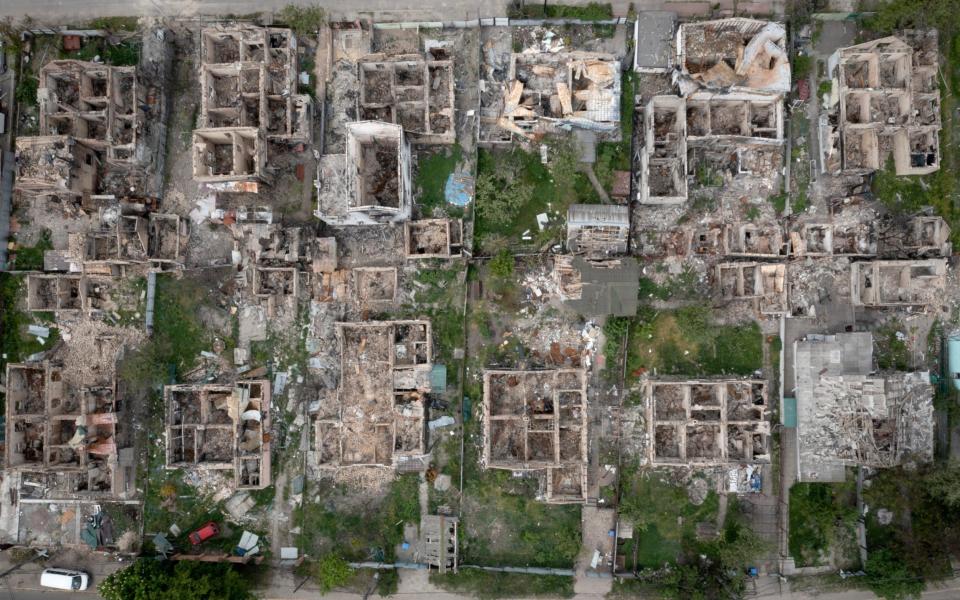 An aerial view of a residential area ruined by the Russian shelling in Irpin close to Kyiv, Ukraine - AP/Efrem Lukatsky