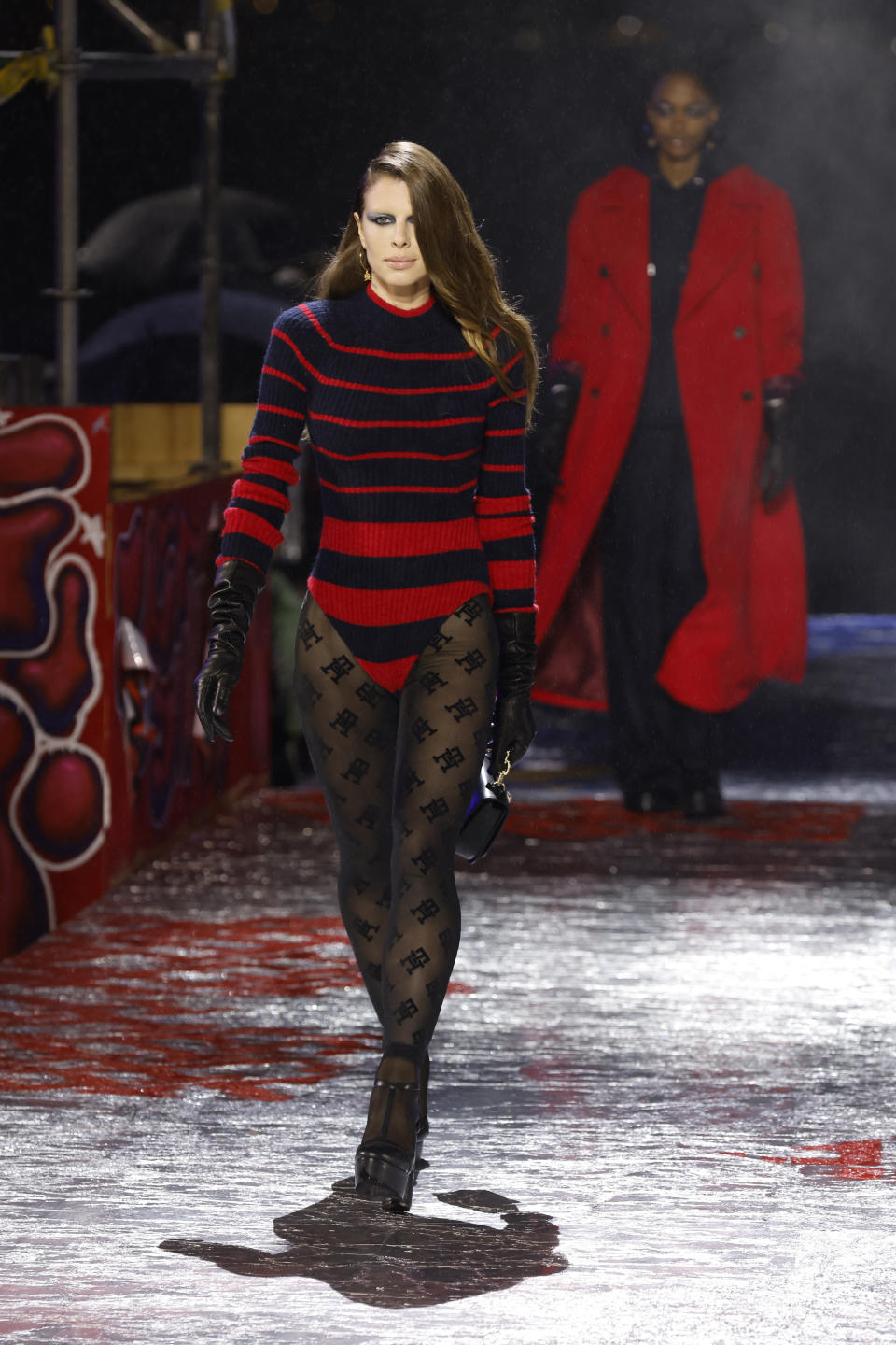 Julia Fox models the Tommy Hilfiger Fall 2022 collection during Fashion Week, Sunday, Sept. 11, 2022, in New York. (AP Photo/Jason DeCrow)