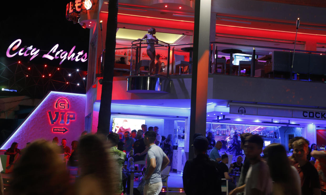 MAGALUF, SPAIN - JUNE 30: Tourists visit the popular Punta Ballena strip on June 30, 2019 in Magaluf, Spain. Magaluf, where most of the nightclubs and bars are located, is one of the main destinations for British tourists during the summer season. (Photo by Clara Margais/Getty Images)