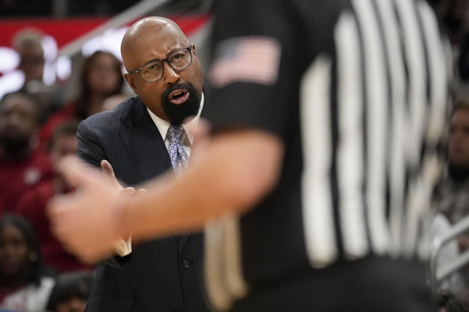 Indiana head coach Mike Woodson questions a call as his team plays Harvard in the second half of an NCAA college basketball game in Indianapolis, Sunday, Nov. 26, 2023. (AP Photo/AJ Mast)