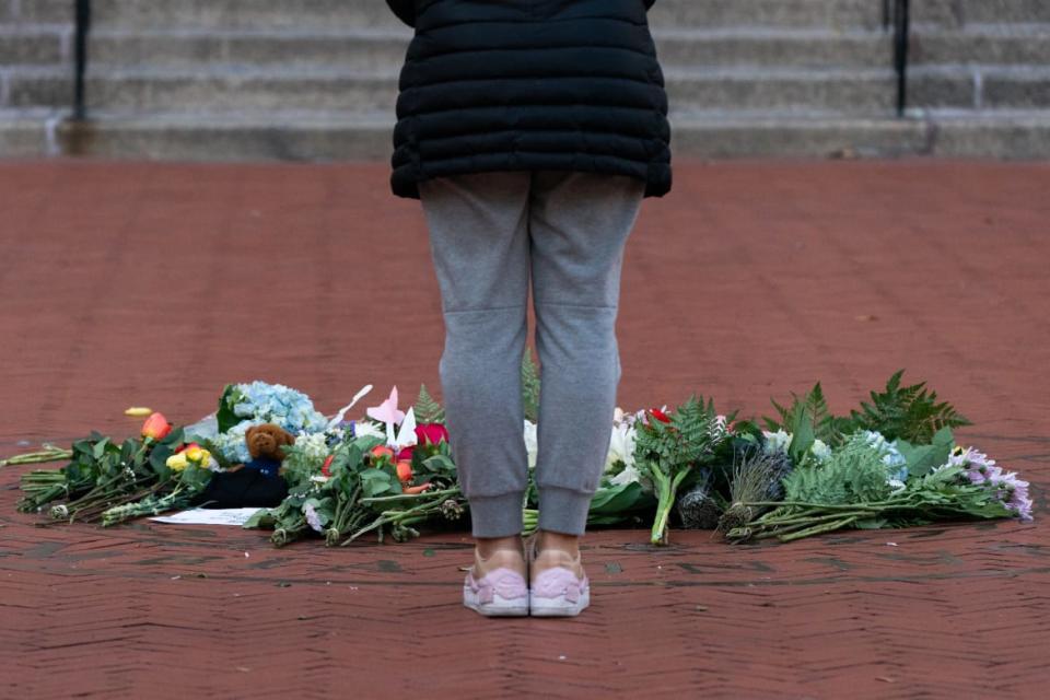 <div class="inline-image__caption"><p>Flowers laid near the entrance of Barnard College after Tessa Majors was stabbed to death</p></div> <div class="inline-image__credit">Jeenah Moon/Getty</div>