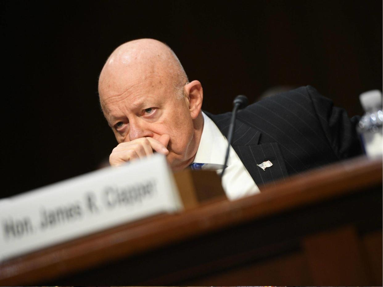 Former Director of National Intelligence James Clapper said US President Donald Trump downplaying Russian election hacking is a threat to national security: JIM WATSON/AFP/Getty Images