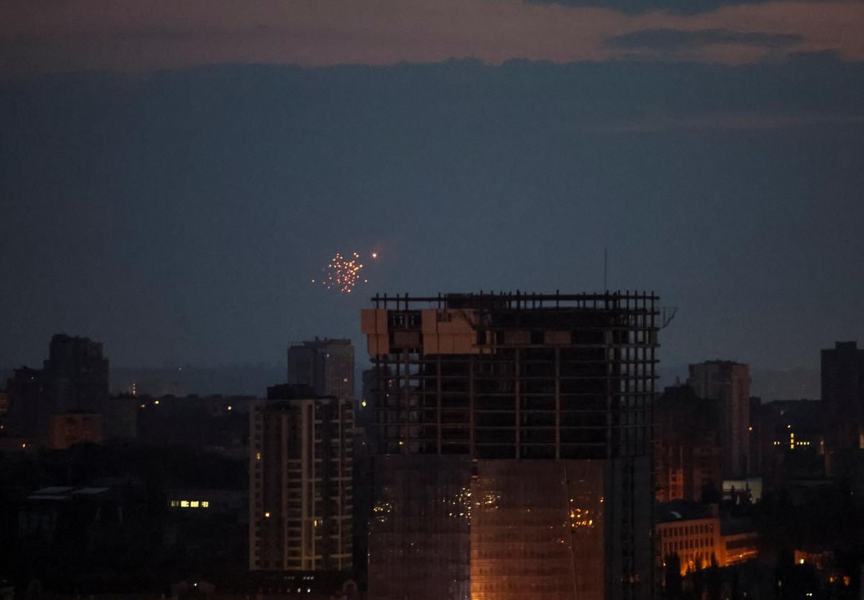 An explosion of a drone is seen in the sky over Kyiv during a Russian drone strike (REUTERS)