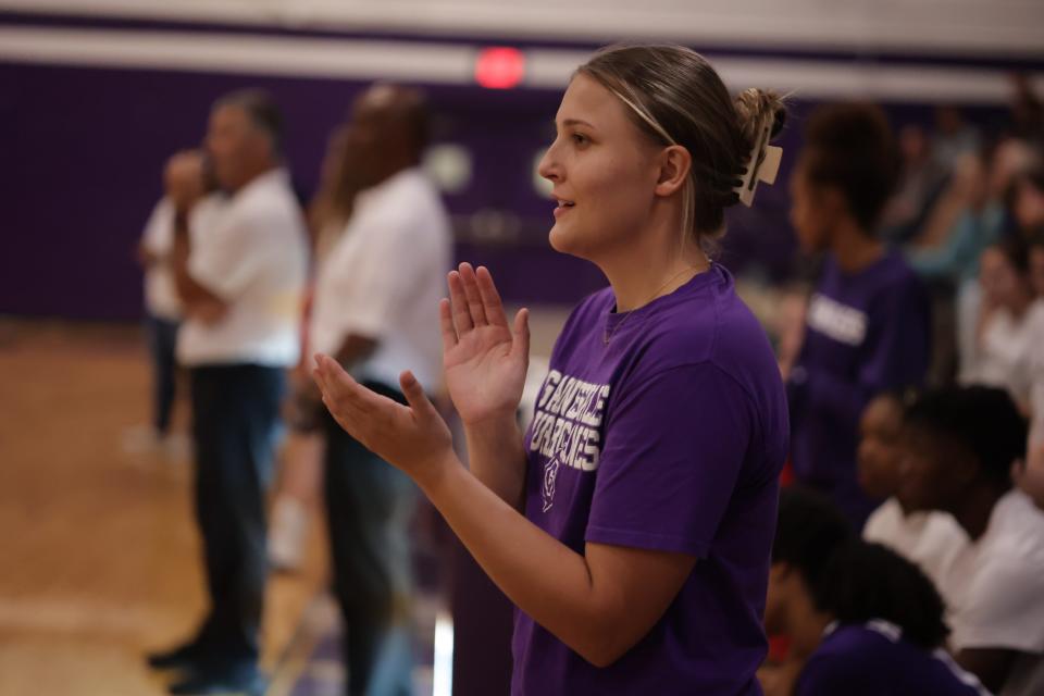 GHS Assistant Head Coach Courtney King clapping during the game against Vanguard at Gainesville High on Tuesday, Aug. 30, 2022.
