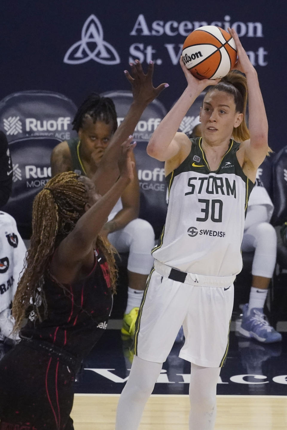 Seattle Storm's Breanna Stewart shoots over Indiana Fever's Jantel Lavender during the second half of a WNBA basketball game Thursday, June 17, 2021, in Indianapolis. (AP Photo/Darron Cummings)