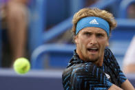 Alexander Zverev, of Germany, returns a shot to Andrey Rublev, of Russia, during the men's single final of the Western & Southern Open tennis tournament, Sunday, Aug. 22, 2021, in Mason, Ohio. (AP Photo/Darron Cummings)