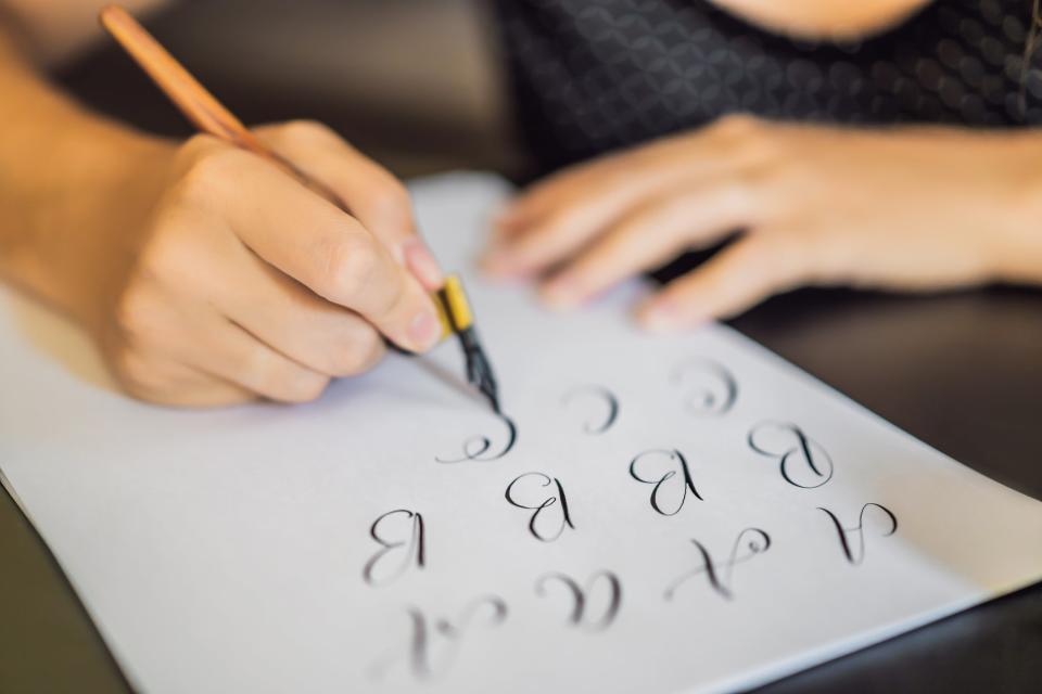 Calligraphy is easy to start, and all you need is a pen and paper – and some ink (Getty)Getty Images