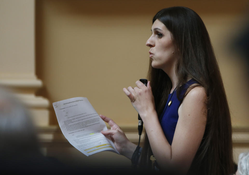 FILE - Del. Danica Roem, D-Prince William, speaks during the House session at the Capitol in Richmond, Va., April 3, 2019. Roem is accustomed to opponents using her transgender identity as a cudgel in Virginia legislative races. After two comfortable reelection wins in Virginia's House of Delegates, Roem won a seat in the state Senate. That helped Democrats get a legislative lock in Virginia, complicating Republican Gov. Glenn Youngkin’s social conservative agenda. (AP Photo/Steve Helber, File)