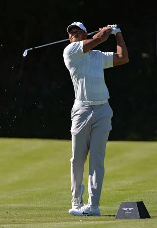 Feb 16, 2018; Pacific Palisades, CA, USA; Tiger Woods plays his shot from the sixth tee during the second round of the Genesis Open golf tournament at Riviera Country Club. Mandatory Credit: Orlando Ramirez-USA TODAY Sports