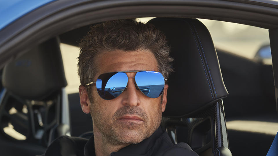 Actor and racer Patrick Dempsey wearing the Air Spring sunglasses. - Credit: Porsche Design