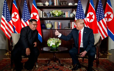 Kim Jong-un and US President Donald Trump met in Singapore in June - Credit: Evan Vucci/AP