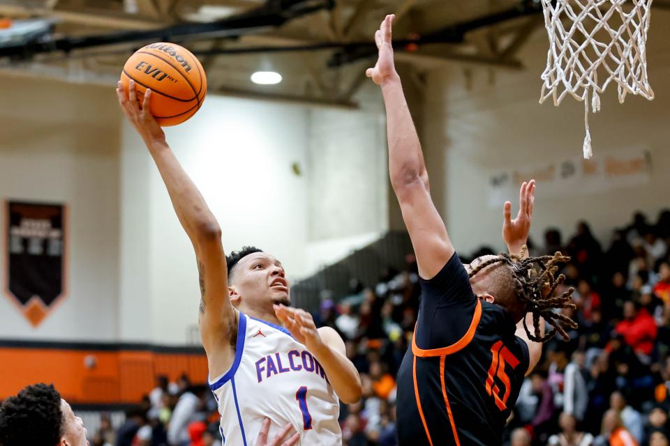 Millwood’s Xon Williams (1) lays up the ball during a high school basketball game between Douglass and Millwood in Oklahoma City, on Saturday, Jan. 13, 2024.