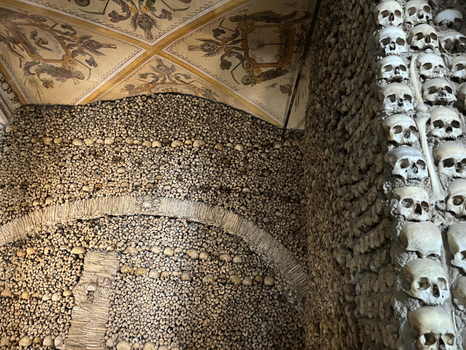 Skeletal remains of an estimated 5,000 people appear inside the Capela dos Ossos, a chapel built by Franciscan monks, in Évora, Portugal on Sept. 20, 2023. (Kristen de Groot via AP)