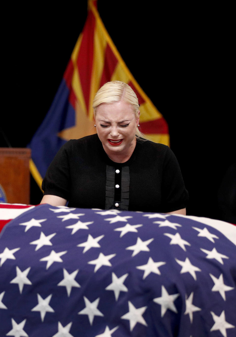 <p>Meghan McCain, daughter of, Sen. John McCain, R-Ariz. cries at the casket of her father during a memorial service at the Arizona Capitol on Wednesday, Aug. 29, 2018, in Phoenix. (Photo: Jae C. Hong, Pool/AP) </p>