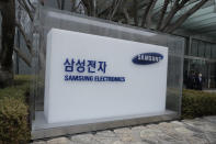 The logo of the Samsung Electronics Co. is seen at its office in Seoul, South Korea, Tuesday, Jan. 31, 2023. Samsung Electronics said Tuesday its profit for the last quarter plummeted nearly 70% as a weak global economy depressed demands for its consumer electronics products and computer memory chips. (AP Photo/Ahn Young-joon)
