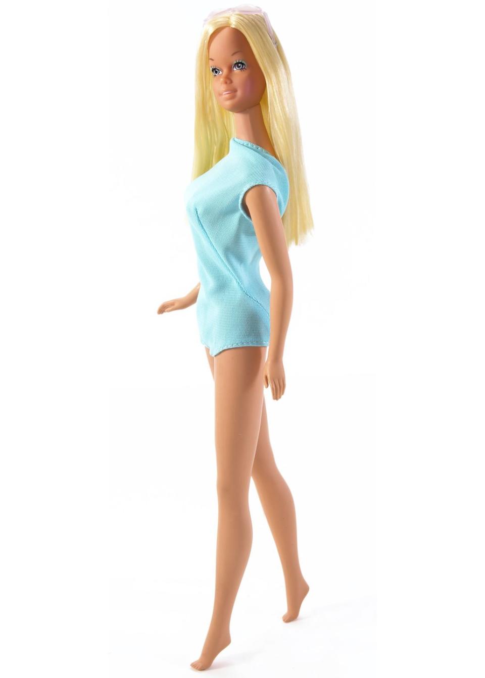 Doll, Barbie, Clothing, Toy, Blond, Joint, Shoulder, Long hair, Dress, Human leg, 