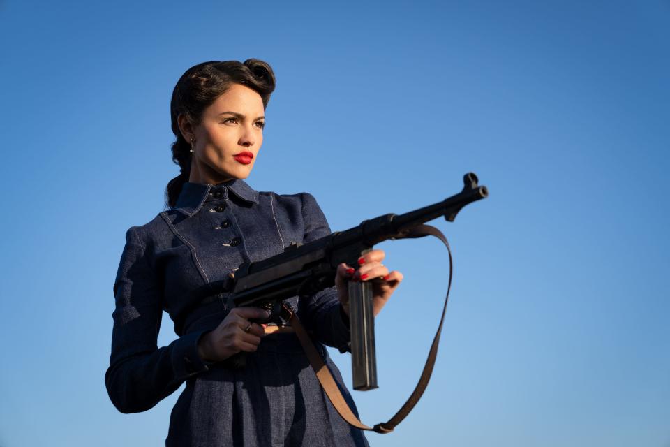 Undercover operative Marjorie Stewart (Eiza González) is an ace with firearms in "The Ministry of Ungentlemanly Warfare."