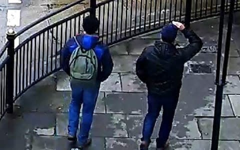 Both suspects are pictured from behind on Fisherton Road - Credit: Metropolitan Police