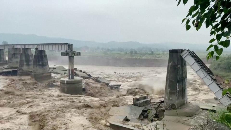 A bridge that collapsed following heavy rain in Kangra, Himachal Pradesh (ANI via Reuters)