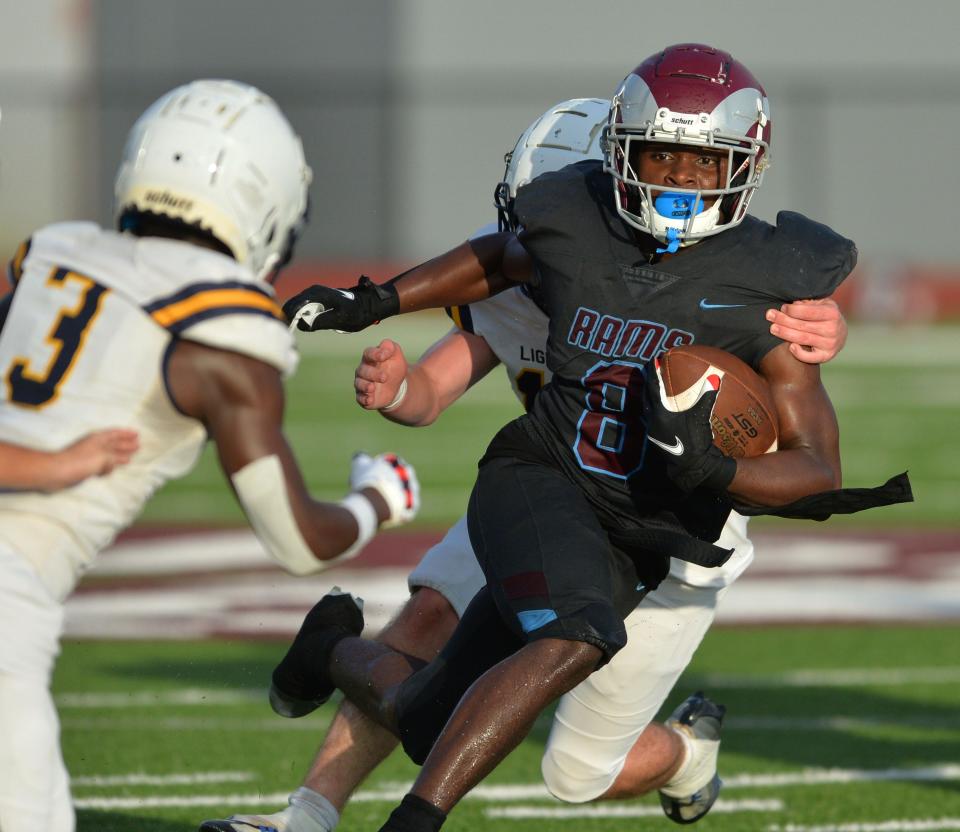 Riverview running back DJ Johnson (#8) carries the ball against Lehigh defenders. Riverview High School hosted Lehigh High School in a spring football game on Friday evening, May 26, 2023. 