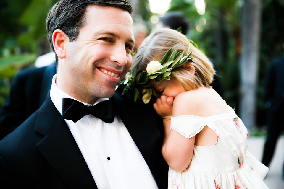 The bride wore Oscar de la Renta, inspired by her grandmother, for her greenery-filled ceremony at the Beverly Hills Hotel.