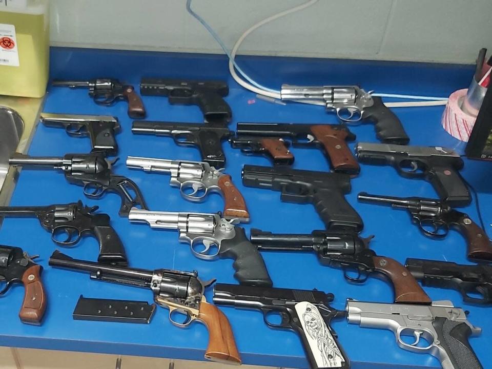 The seizure consisted of 49 firearms, including an AR-15. (Submitted by Strathmore RCMP - image credit)