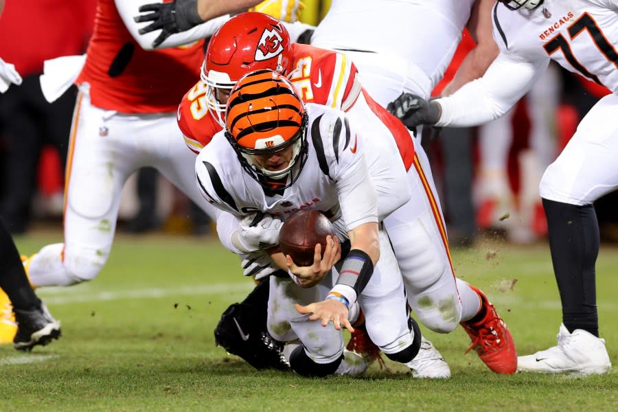 KANSAS CITY, MISSOURI – JANUARY 29: Chris Jones #95 of the Kansas City Chiefs sacks Joe Burrow #9 of the Cincinnati Bengals during the fourth quarter in the AFC Championship Game at GEHA Field at Arrowhead Stadium on January 29, 2023 in Kansas City, Missouri. (Photo by Kevin C. Cox/Getty Images)