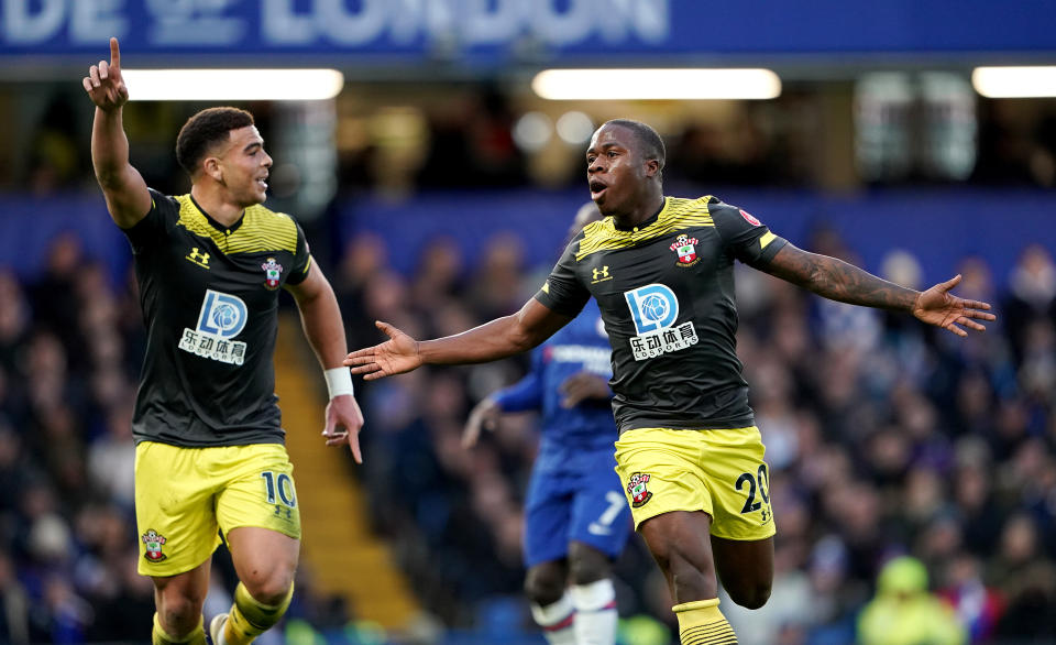 Southampton's Michael Obafemi (right) celebrates scoring his side's first goal of the game  with team-mate Che Adams Chelsea v Southampton - Premier League - Stamford Bridge 26-12-2019 . (Photo by  Tess Derry/EMPICS/PA Images via Getty Images)