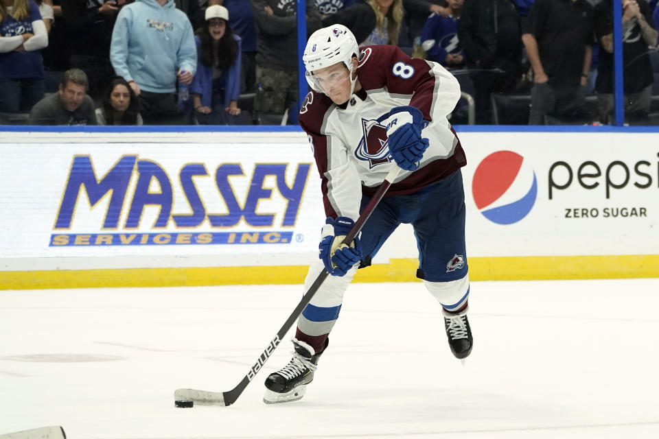 Colorado Avalanche defenseman Cale Makar (8) prepares to score against Tampa Bay Lightning goaltender Andrei Vasilevskiy during a shootout in an NHL hockey game Saturday, Oct. 23, 2021, in Tampa, Fla. (AP Photo/Chris O'Meara)