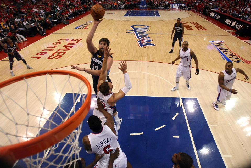 LOS ANGELES, CA - MAY 11: Marc Gasol #33 of the Memphis Grizzlies shoots the ball over Blake Griffin #32 of the Los Angeles Clippers in the first half in Game Six of the Western Conference Quarterfinals in the 2012 NBA Playoffs on May 11, 2012 at Staples Center in Los Angeles, California. NOTE TO USER: User expressly acknowledges and agrees that, by downloading and or using this photograph, User is consenting to the terms and conditions of the Getty Images License Agreement. (Photo by Stephen Dunn/Getty Images)