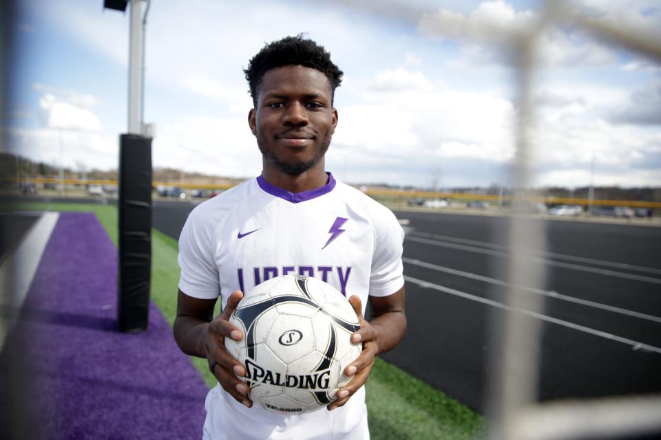 Flori Gembo poses for a portrait at Liberty High School's soccer field in North Liberty, Iowa.