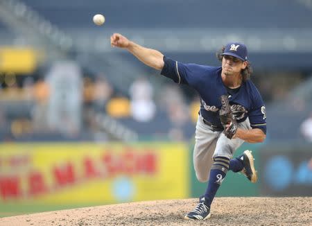 Jul 15, 2018; Pittsburgh, PA, USA; Milwaukee Brewers relief pitcher Taylor Williams (54) pitches against the Pittsburgh Pirates during the tenth inning at PNC Park. Pittsburgh won 7-6 in ten innings. Mandatory Credit: Charles LeClaire-USA TODAY Sports