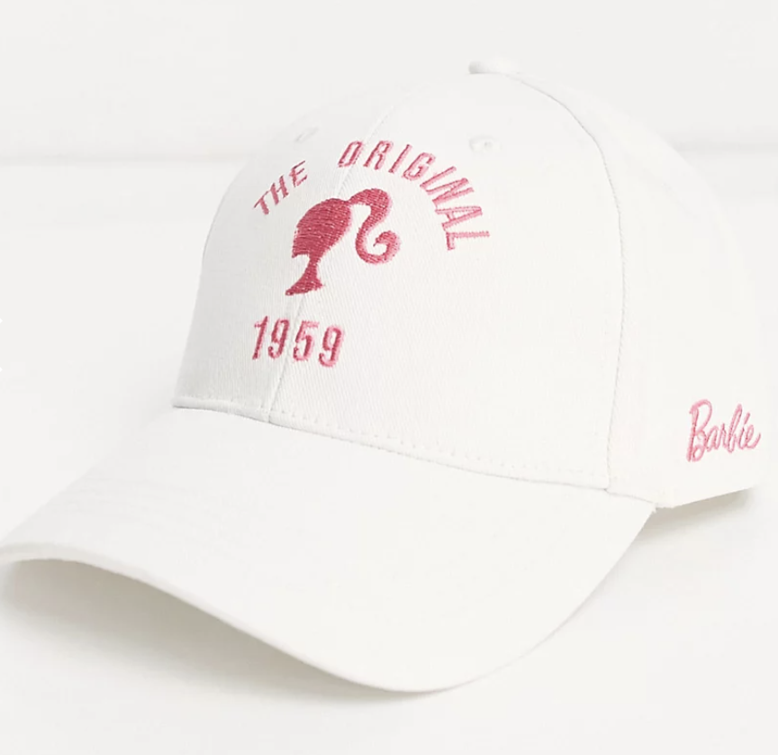 white and pink baseball cap