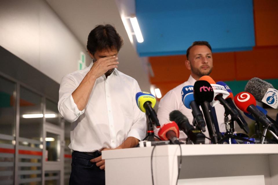 PHOTO: Defense Minister Robert Kalinak, flanked by Interior Minister Matus Sutaj Estok, reacts during a news conference at F.D. Roosevelt University Hospital, where Prime Minister Robert Fico was taken after being shot in Handlova, Slovakia, May 15, 2024. (Bernadett Szabo/Reuters)