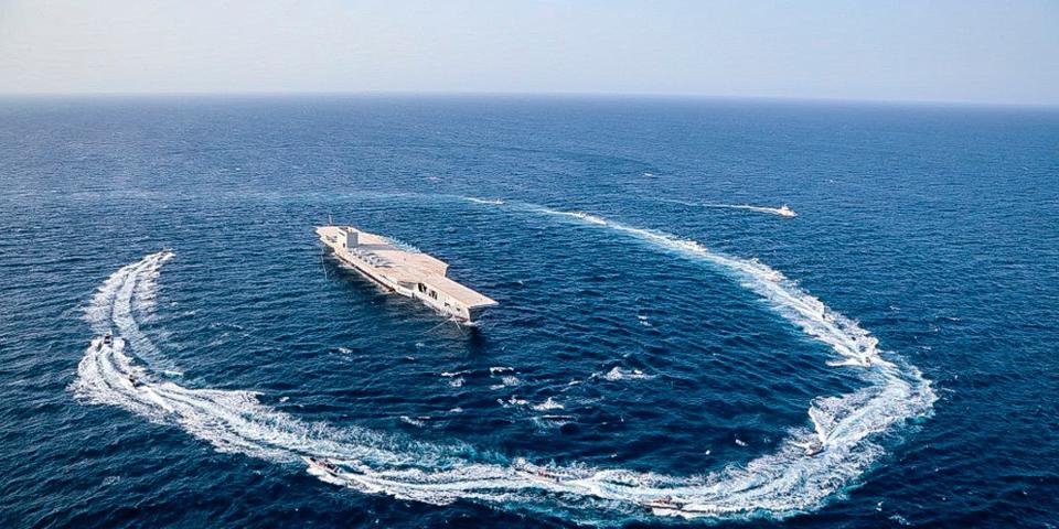 Iran strait of hormuz exercise on replica US aircraft carrier