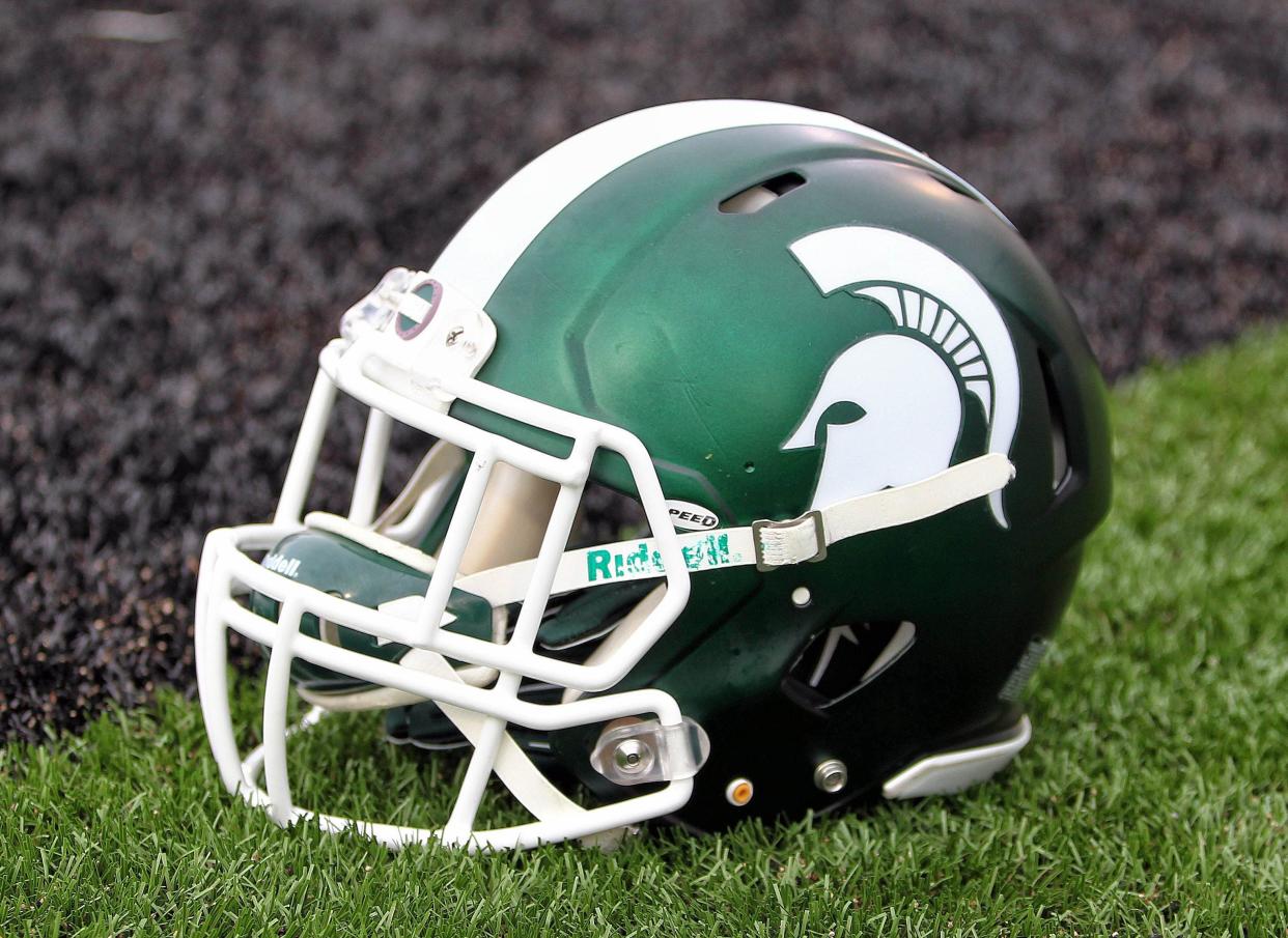 Sep 4, 2015; Kalamazoo, MI, USA; General view of Michigan State Spartans helmet on field prior to a game against Western Michigan at Waldo Stadium. Mandatory Credit: Mike Carter-USA TODAY Sports