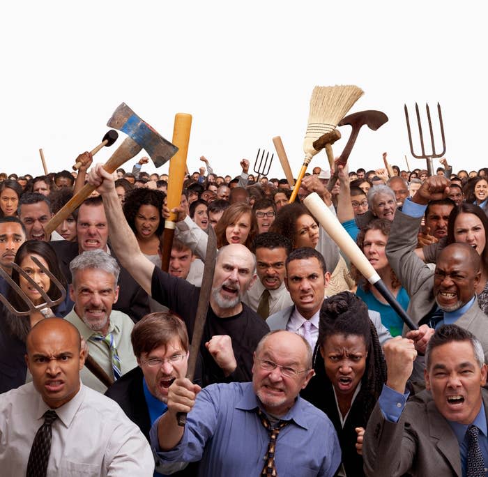 A diverse group of people holding various household and garden tools, expressing anger and determination as if participating in a protest or uprising. No well-known celebrities