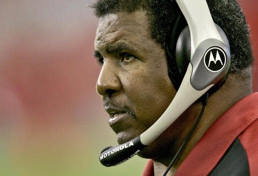 FILE - In this Nov. 19, 2006, file photo, Arizona Cardinals head coach Dennis Green watches from the sidelines during the second quarter of an NFL football game against the Detroit Lions in Glendale, Ariz. Green, a trailblazing coach who led a Minnesota Vikings renaissance in the 1990s and also coached the Cardinals, has died. He was 67. Green’s family posted a message on the Cardinals website on Friday, July 22, 2016,  announcing the death.(AP Photo/Matt York, File)