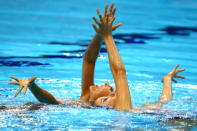 LONDON, ENGLAND - AUGUST 06: Yukiko Inui and Ou Liu of Japan compete in the Women's Duets Synchronised Swimming Free Routine Preliminary on Day 10 of the London 2012 Olympic Games at the Aquatics Centre on August 6, 2012 in London, England. (Photo by Al Bello/Getty Images)