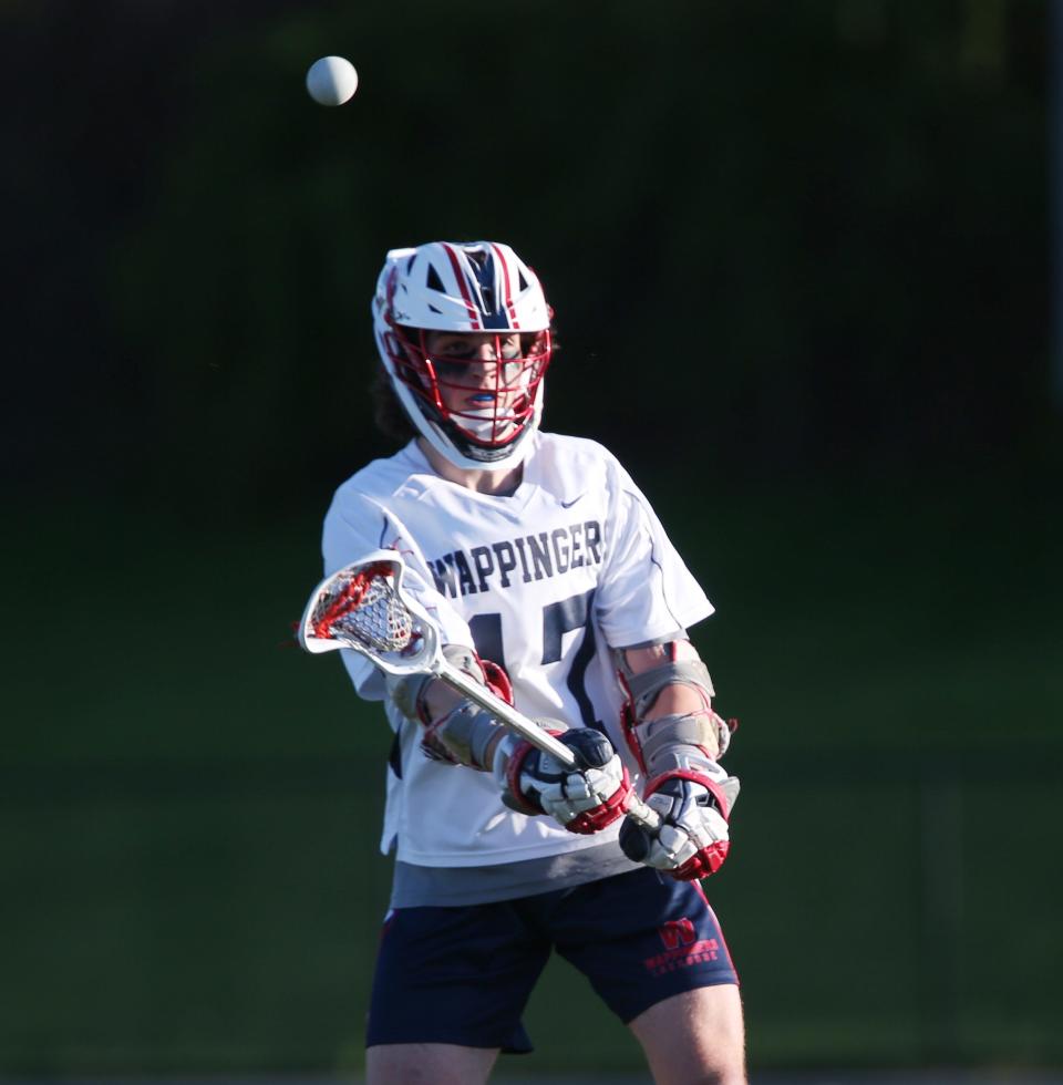 Wappingers' DJ Velsmid passes the ball during Monday's game versus Hendrick Hudson on May 9, 2022.