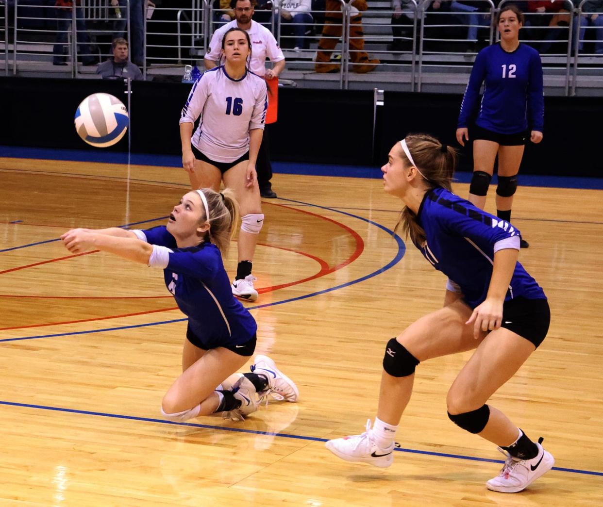 Inland Lakes senior Olivia Monthei saves a deep ball in the corner during the first set of the Bulldogs' Division 4 volleyball state championship clash with Battle Creek St. Philip at Kellogg Arena in Battle Creek on Saturday.