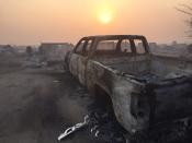 A burned-out truck in the Beacon Hill area of Fort McMurray, Alta. is shown on Wednesday, May 4, 2016. THE CANADIAN PRESS/HO-Radio-Canada-Sylvain Bascaron