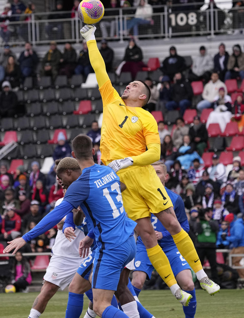 Slovenia goalkeeper Igor Vekic punches the ball away during the first half of an international friendly soccer match against the United States in San Antonio, Saturday, Jan. 20, 2024. (AP Photo/Eric Gay)